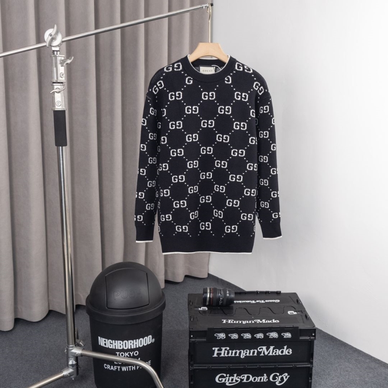 G*u*i sweaters